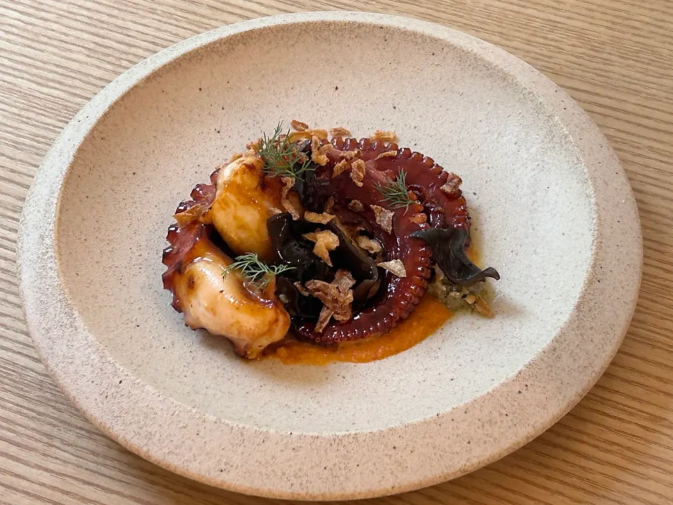 Pyu Euljiro's charcoal-grilled octopus with romesco