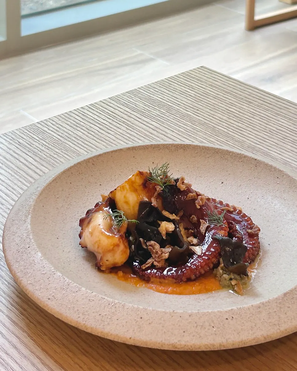 Grilled octopus paired with romesco sauce