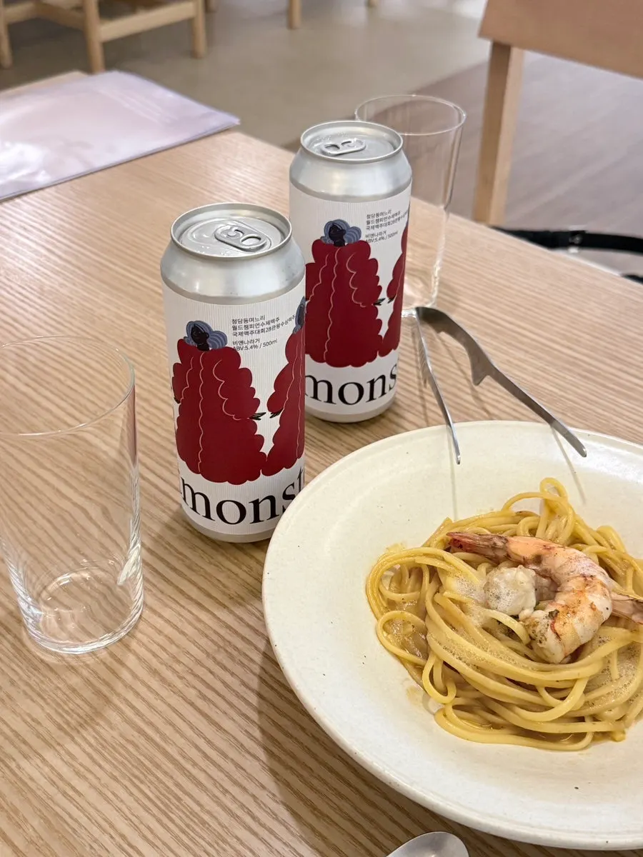 A plate of bisque pasta topped with champagne foam
