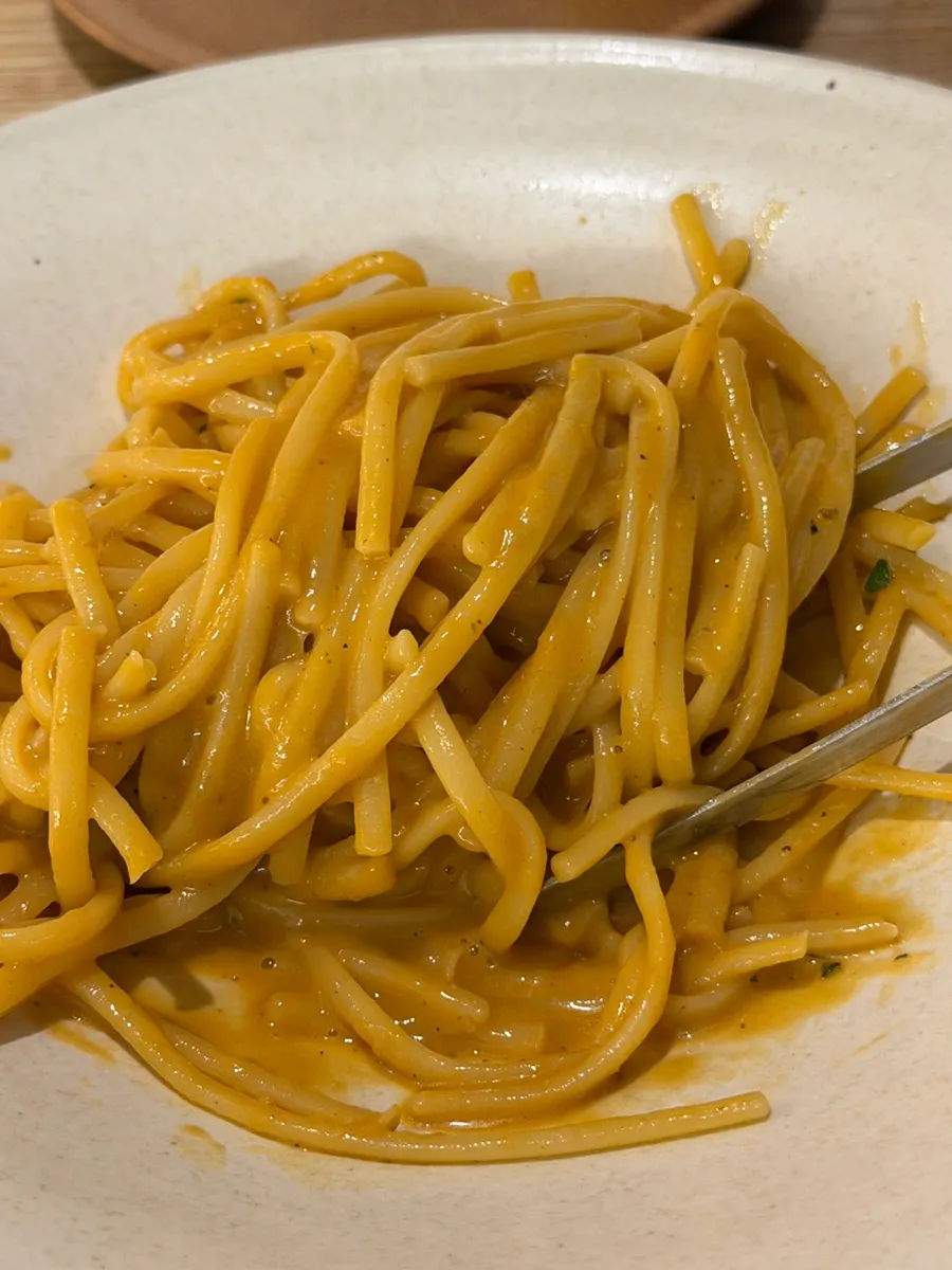 Bisque pasta noodles coated in rich shrimp-head sauce