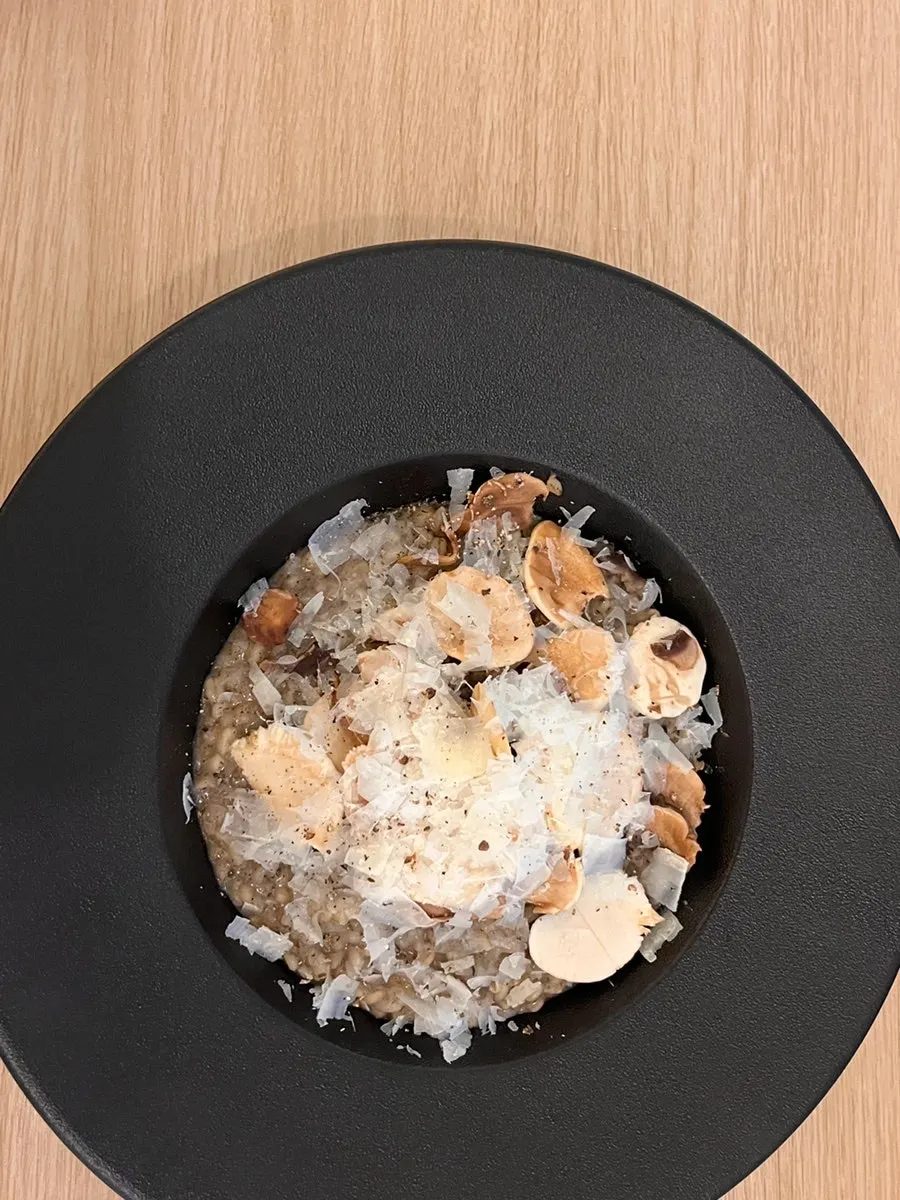 The additional truffle mushroom risotto that was ordered