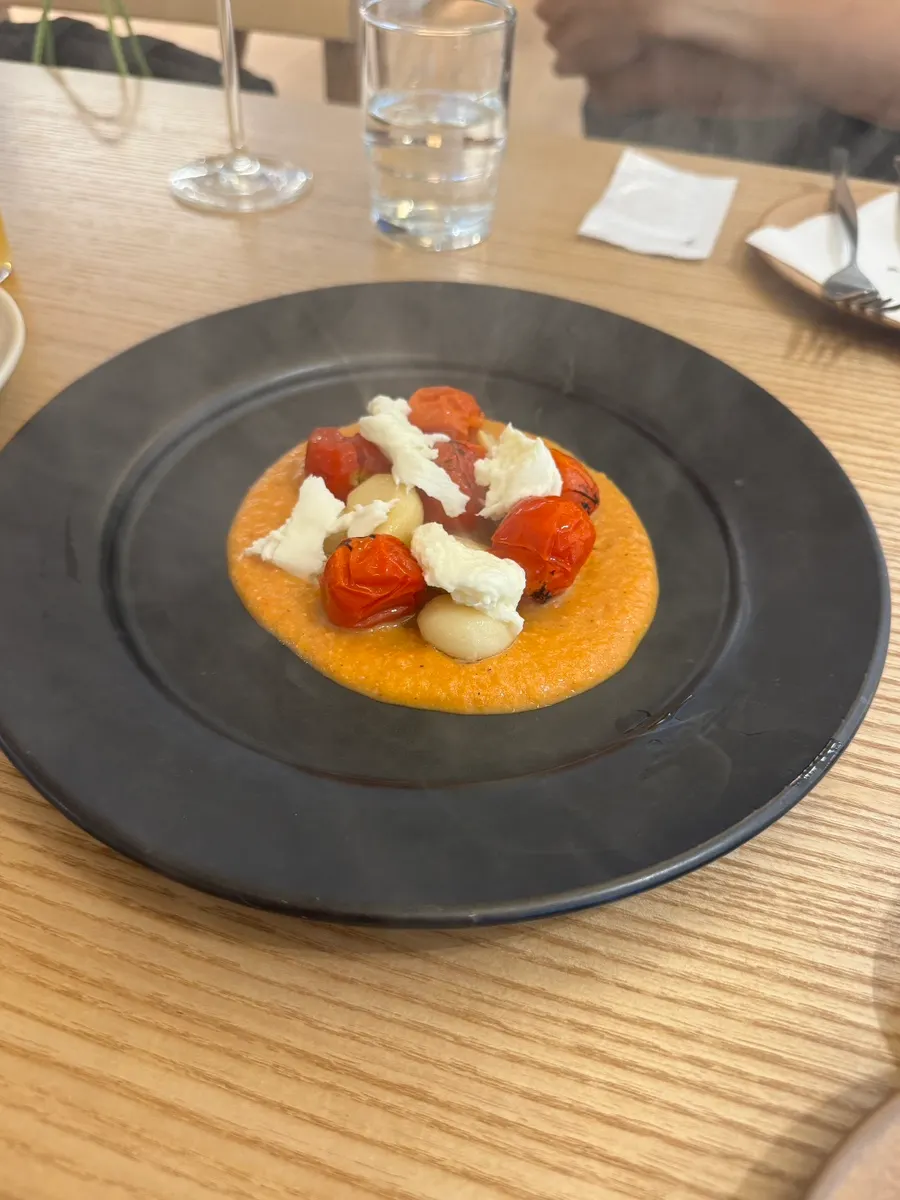 Bread served alongside the smoked tomato