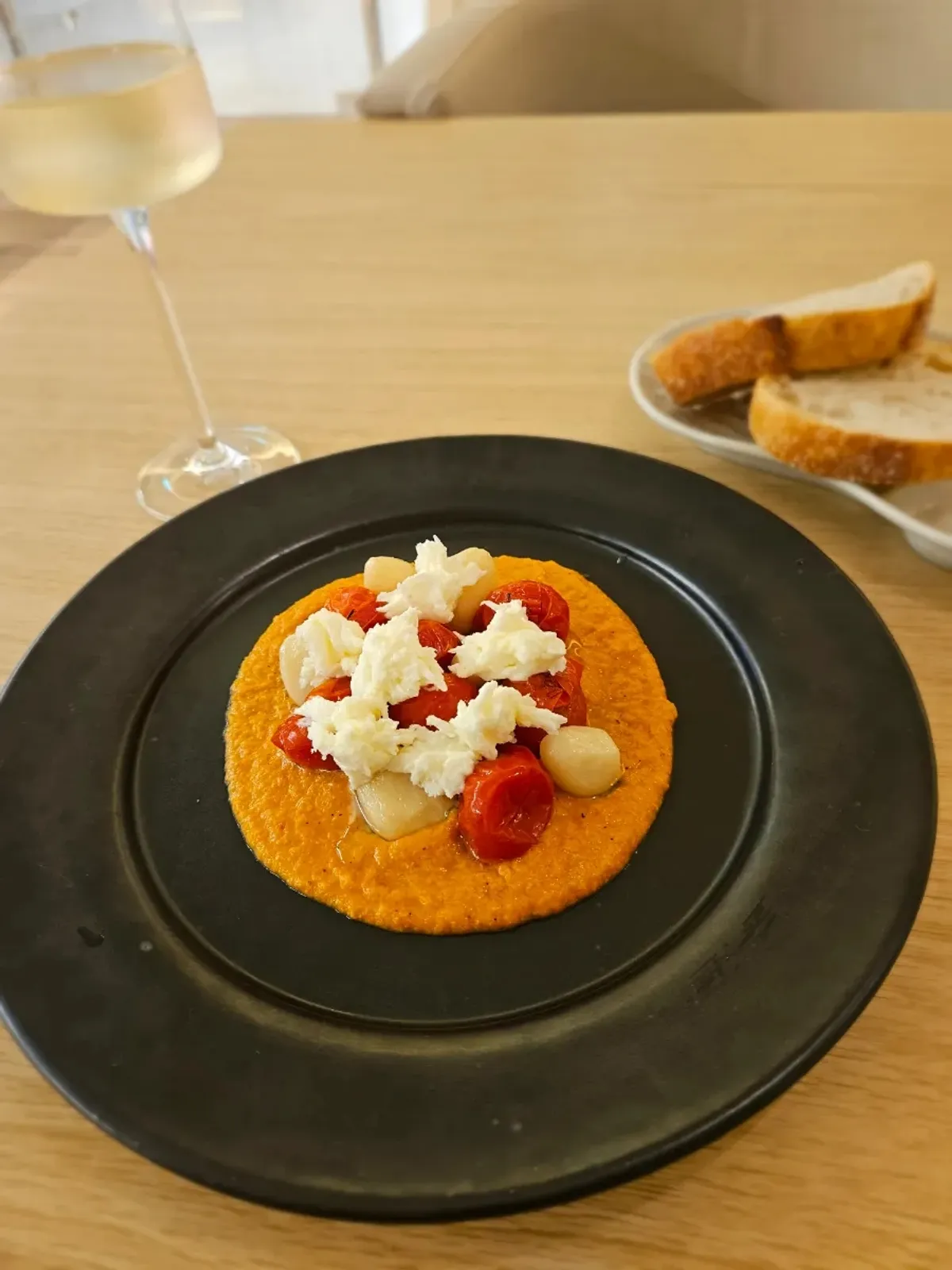 Plating of smoked tomato at Pyu Euljiro