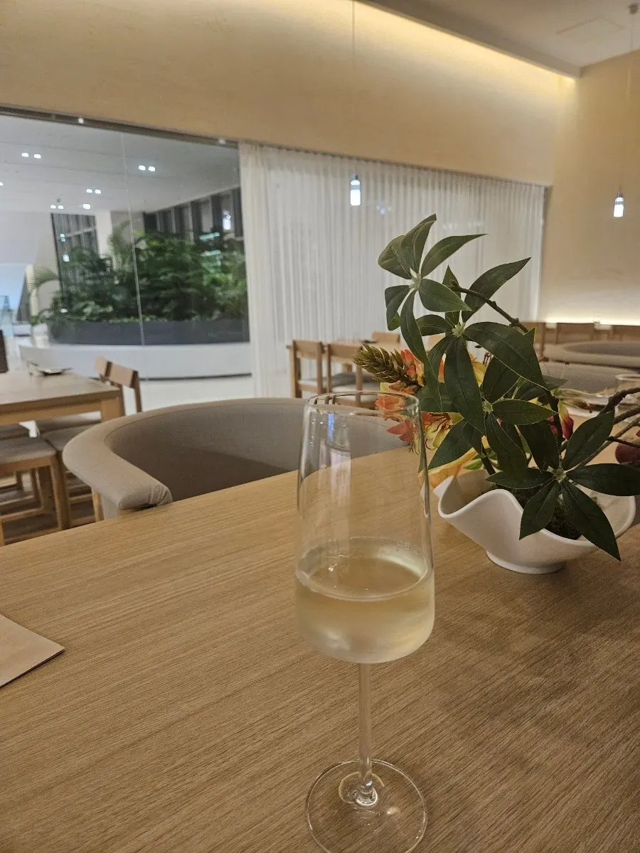 Softly lit evening dining hall at Pyu Euljiro