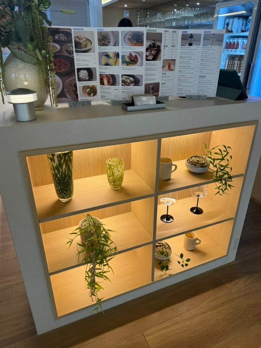 Wooden lattice display case near the entrance of Pyu Euljiro
