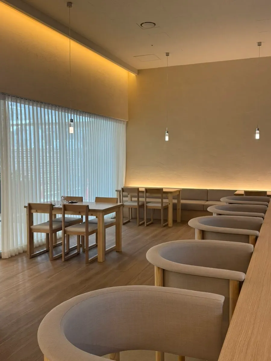 Interior seating and lighting details at Pyu Euljiro