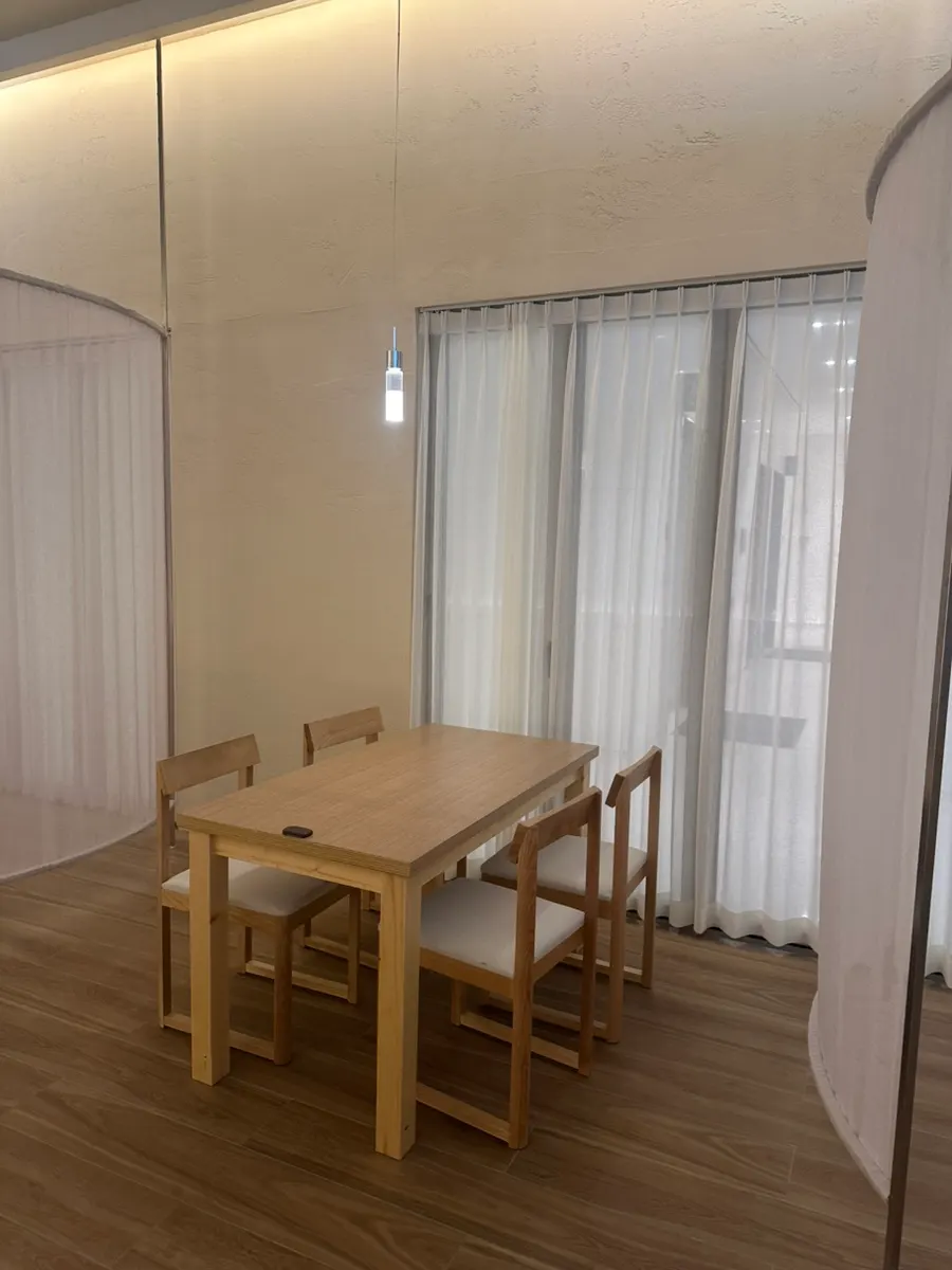 Semi-private table screened with cloth