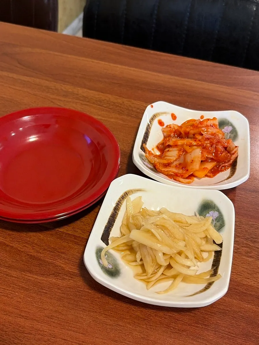 Basic side dishes of kimchi and pickled onions