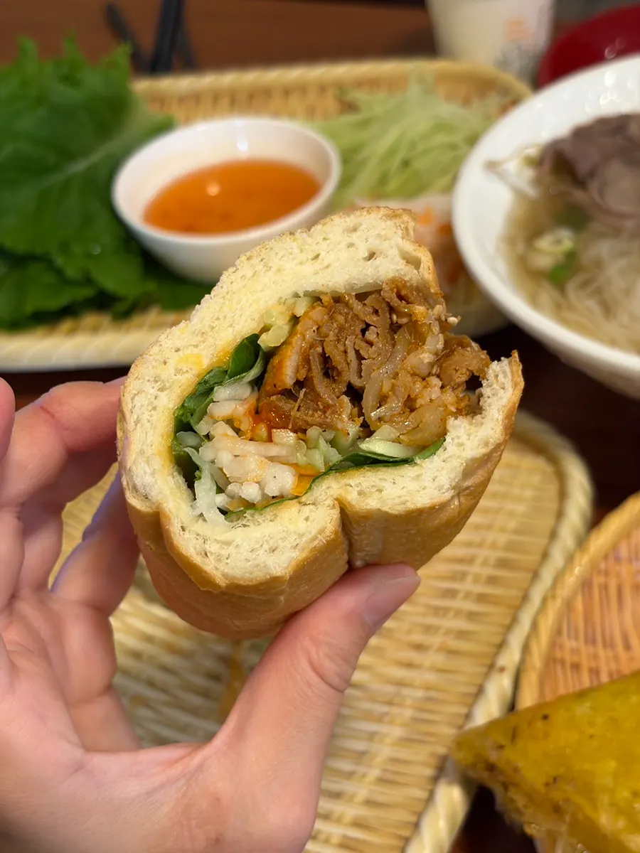 Cross-section of a bulgogi banh mi packed with filling