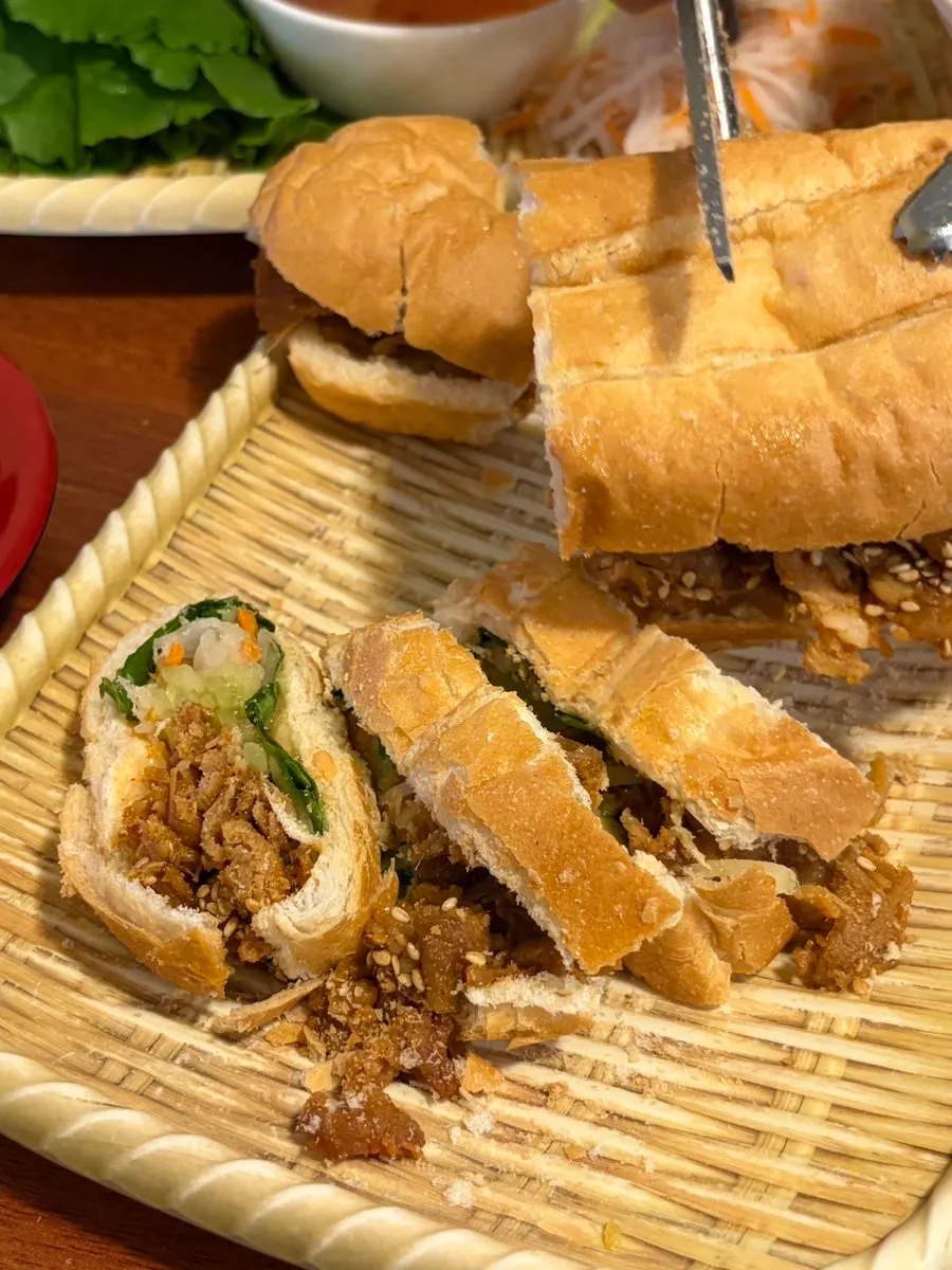 Banh mi cut into bite-sized pieces with scissors