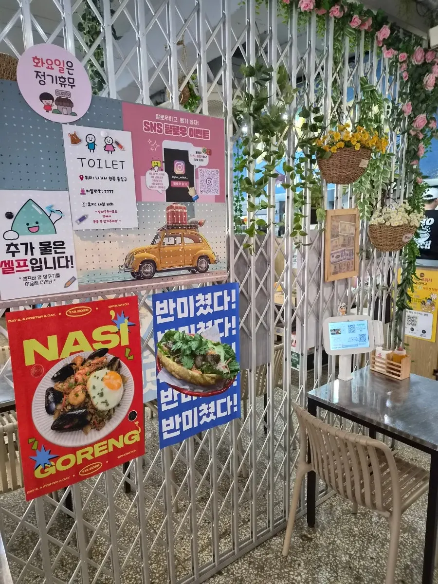 Wall with Pho Witch's brand story board