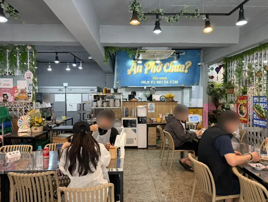 Seating inside Pho Witch with Vietnamese-inspired interior