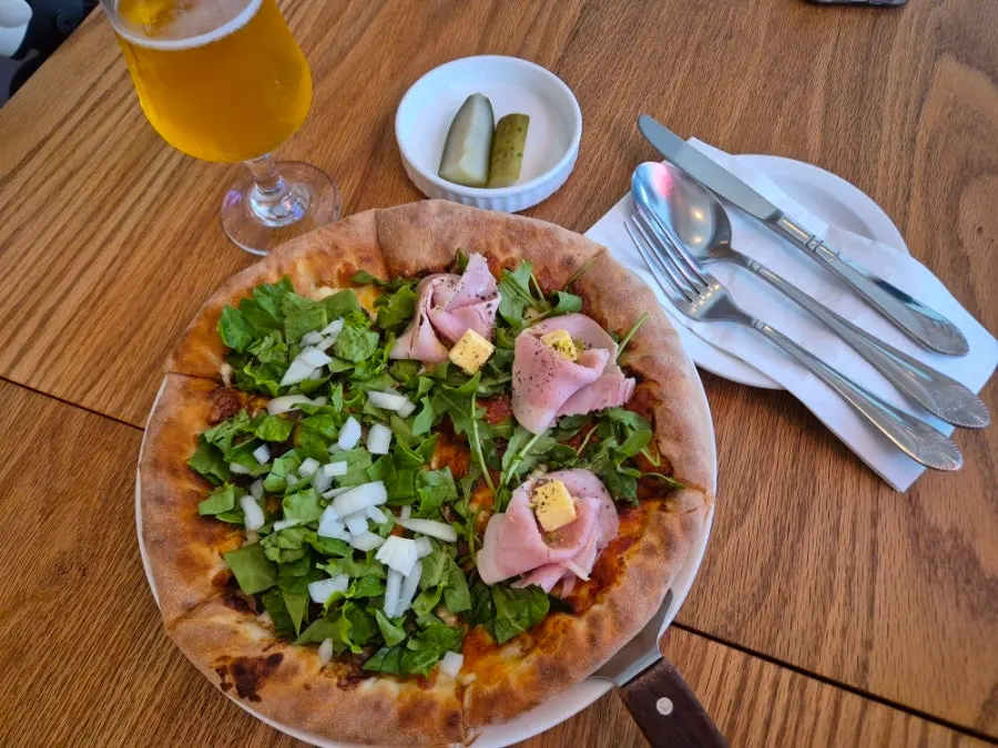 Warm pizza and cold beer, the classic pizza-and-beer combo