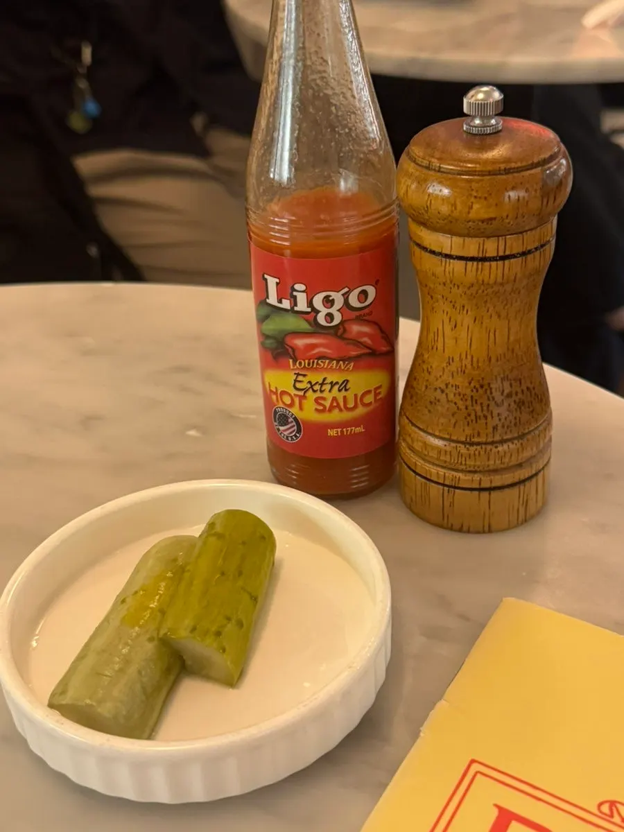 Zero-sugar cola in an ice glass topped with a lemon slice