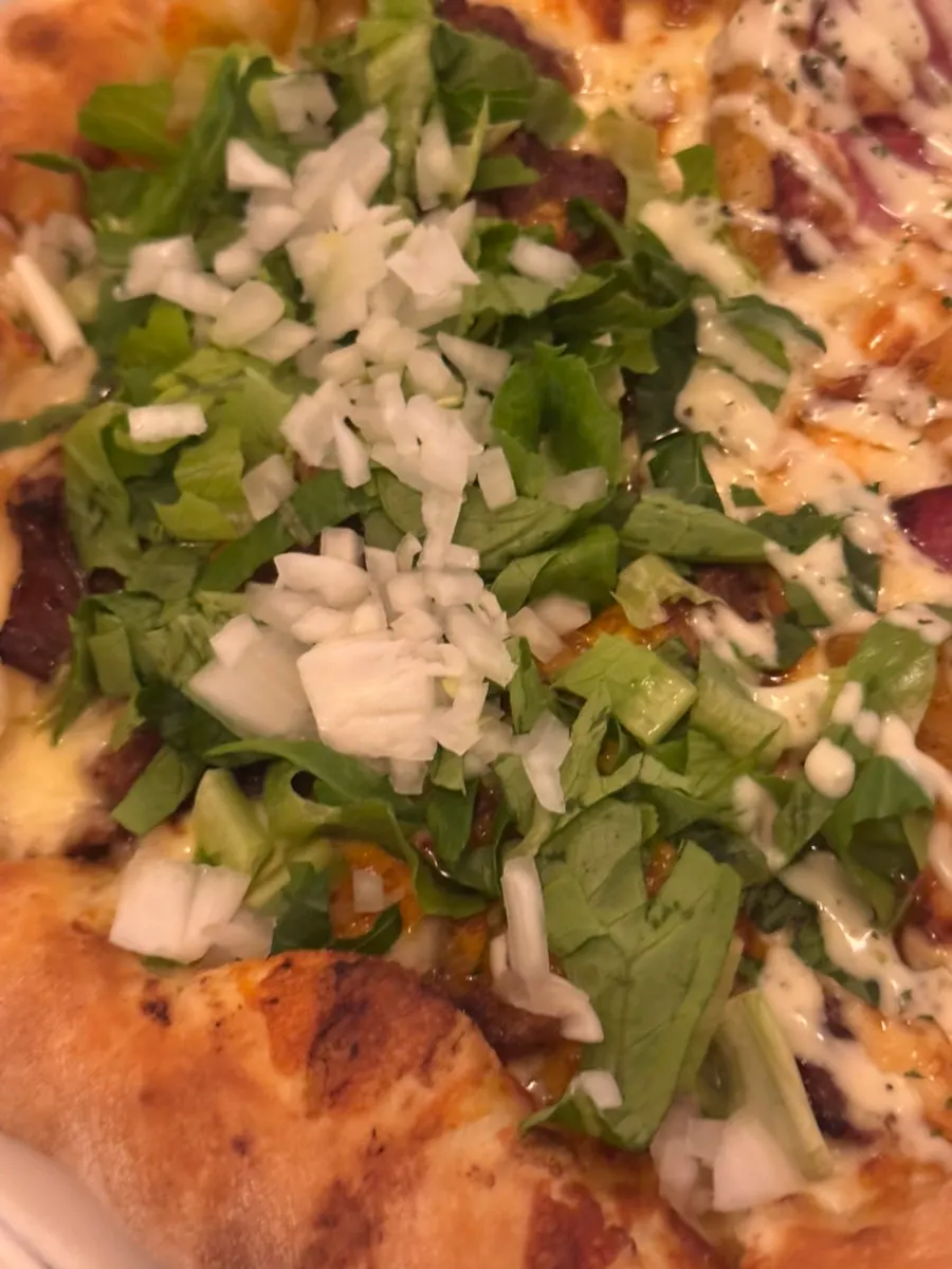 Close-up shot of the half-and-half pizza