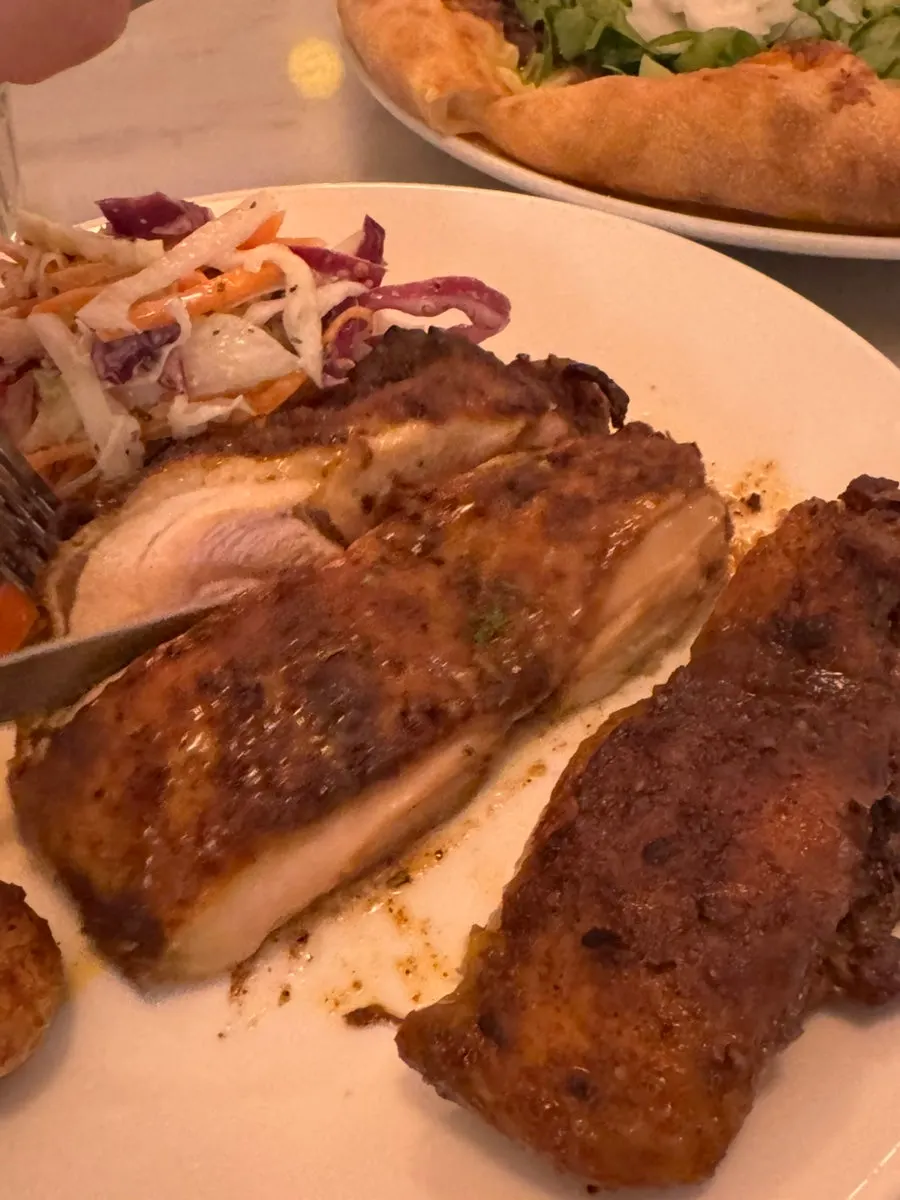 Herb-seasoned grilled chicken thigh