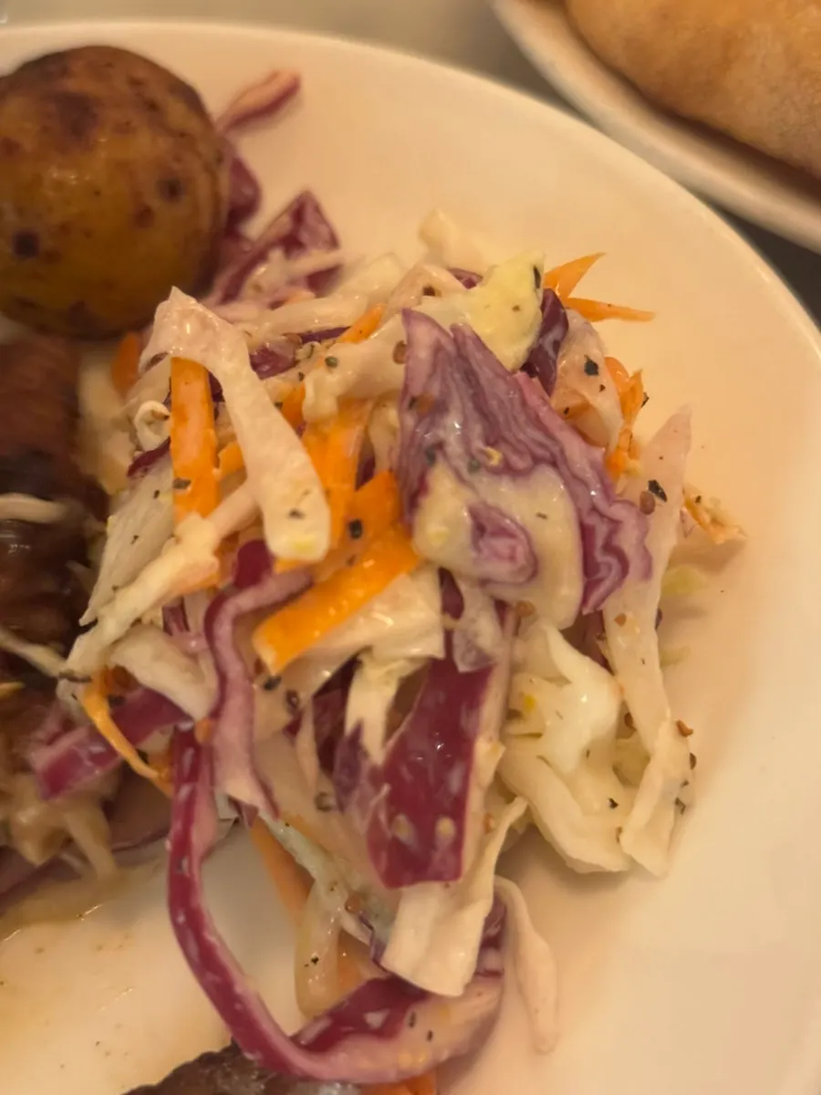 Chicken steak sliced open with a knife