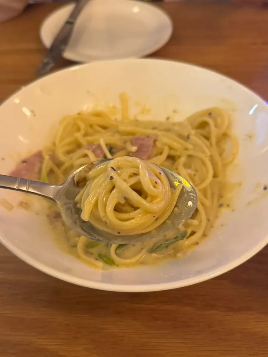 Bacon cream pasta mixed with sauce