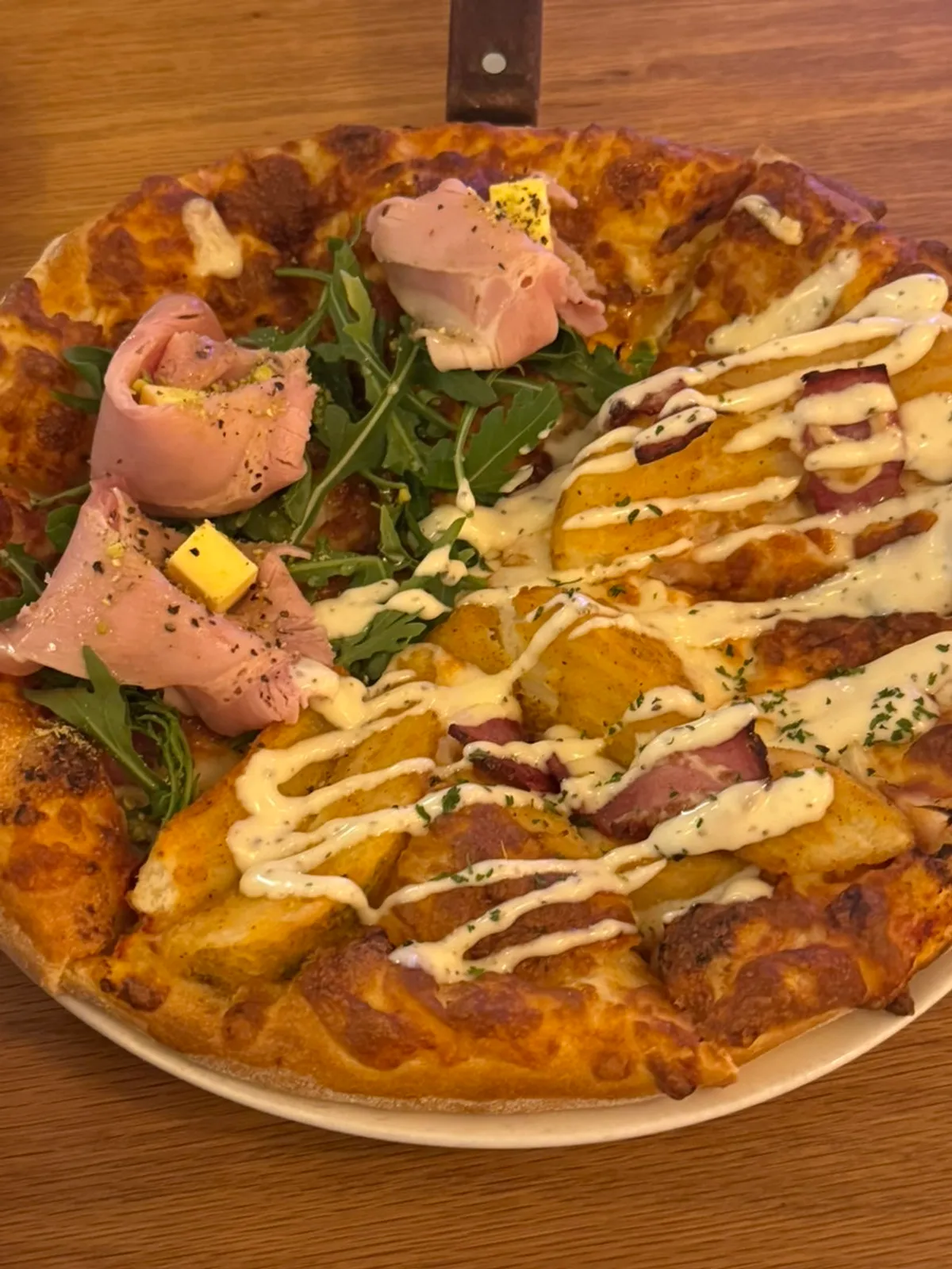 Whole pizza split between jambon-beurre and potato