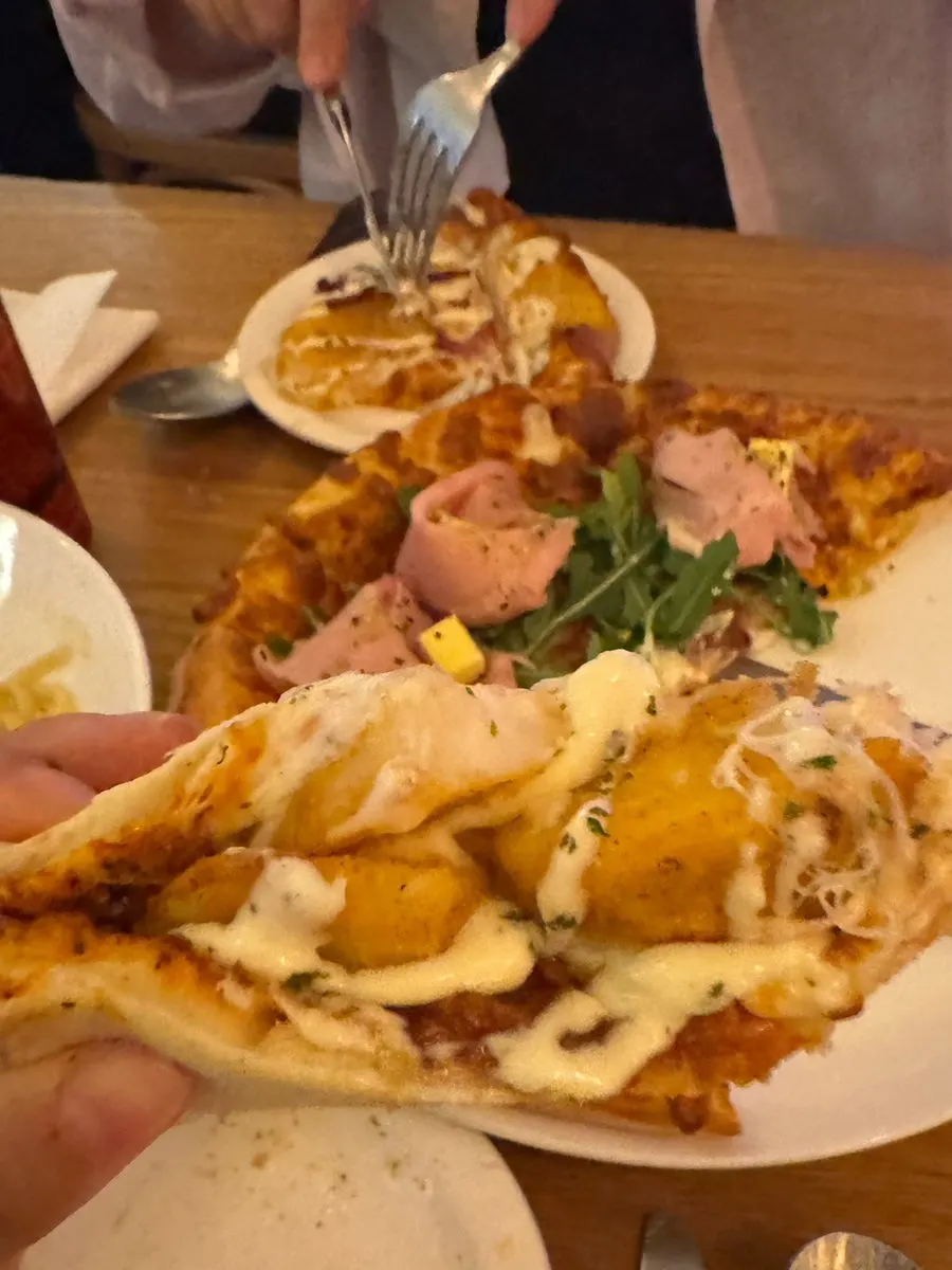 A slice of jambon-beurre pizza