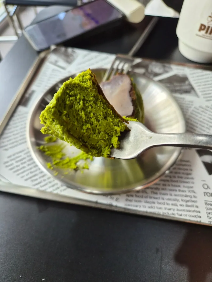 Cross-section of the matcha basque cheesecake