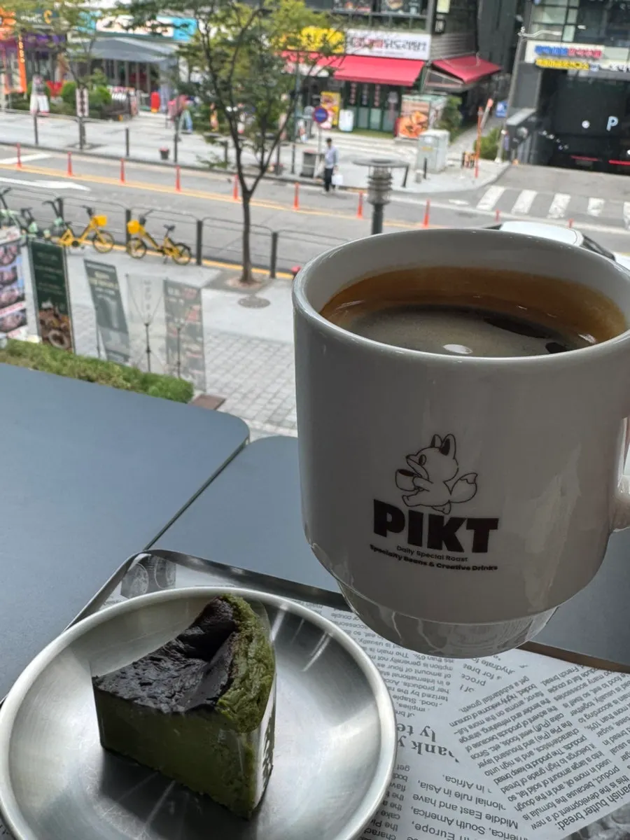 Decaf americano enjoyed at a window seat