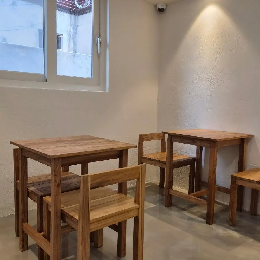Seating by the floor-to-ceiling windows overlooking outside