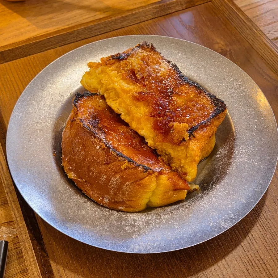 Aged French toast cut into four pieces