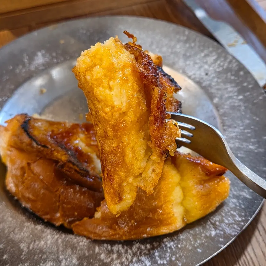 Cross-section of the French toast showing its moist center