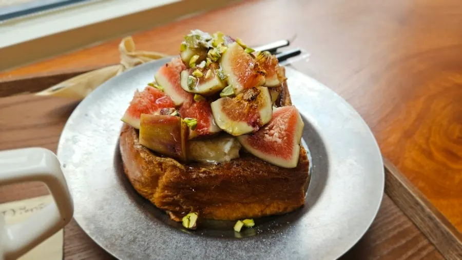 Moist French toast topped with fresh figs