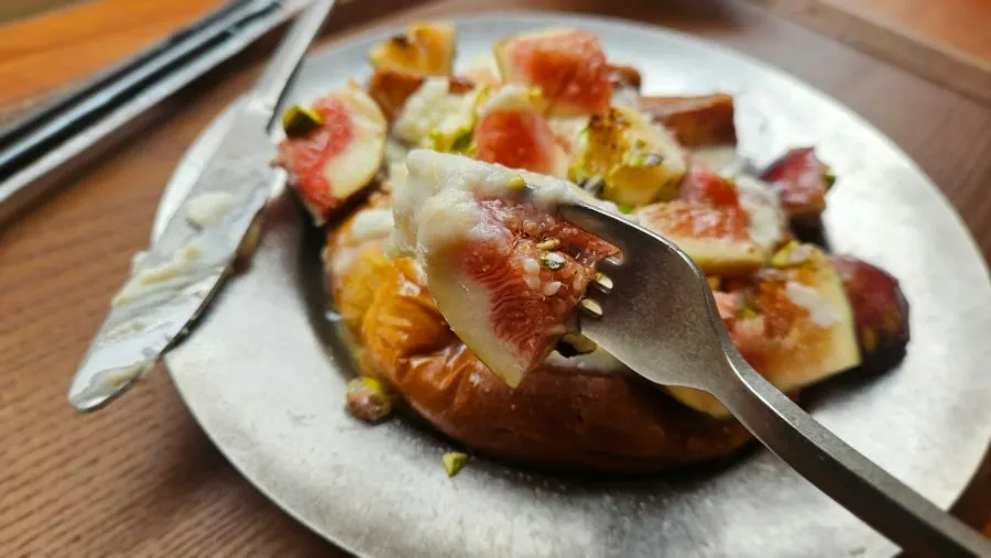 The last bite of French toast full of cream cheese
