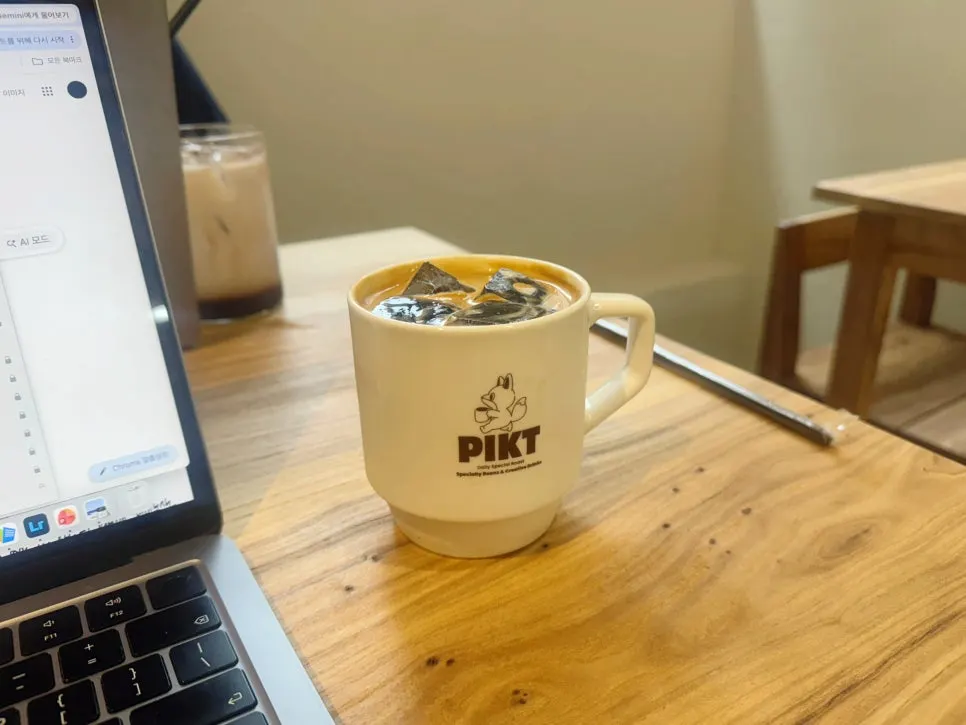 PICT Roastery store cup printed with its character design