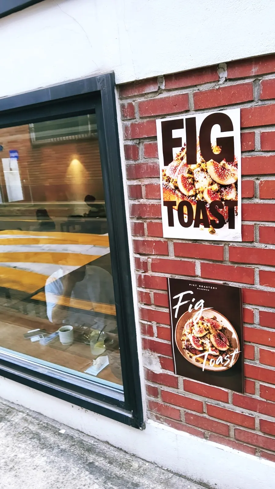 Dessert poster hanging near the café entrance