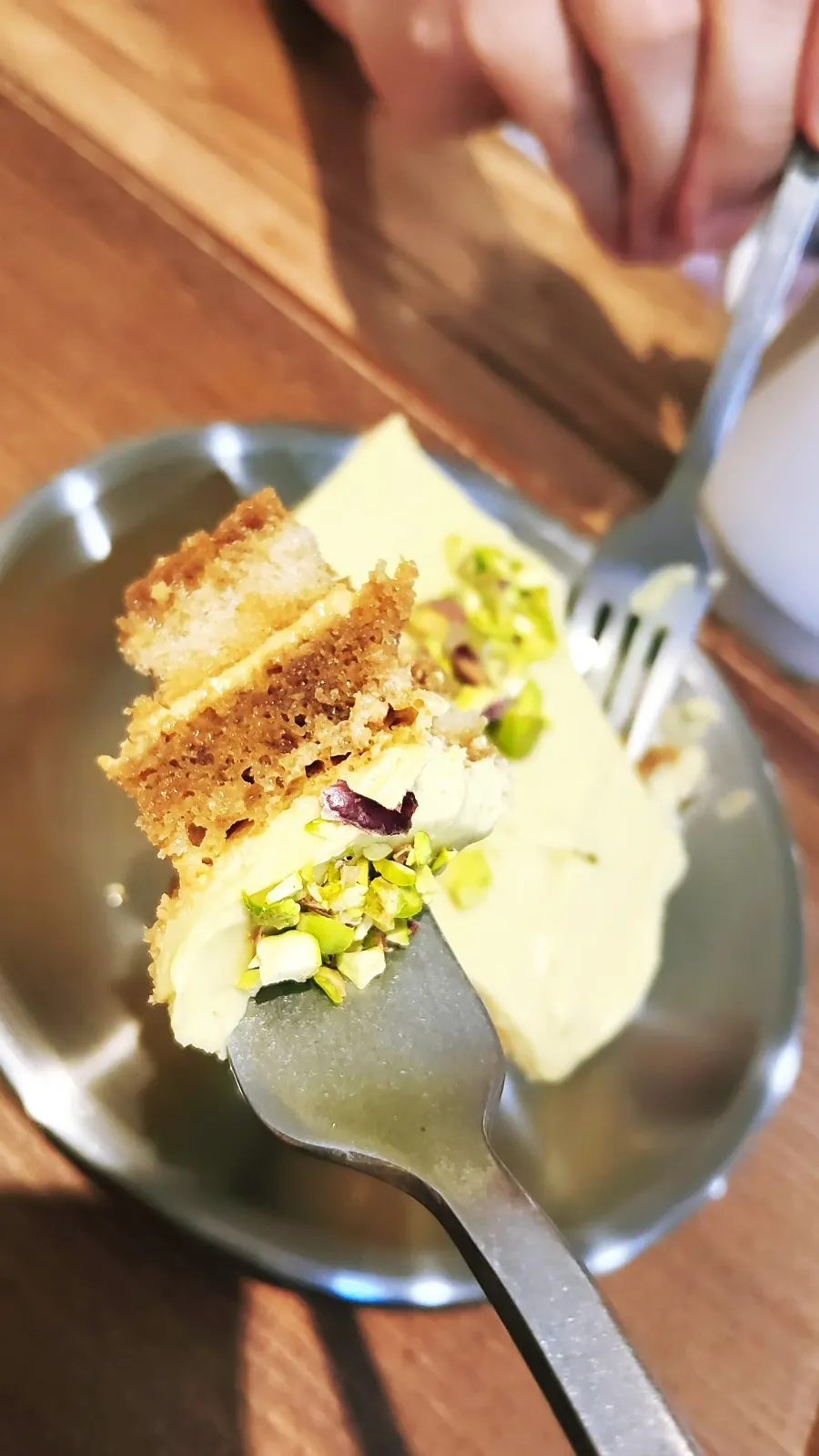 Cross-section of the pistachio tiramisu after a bite