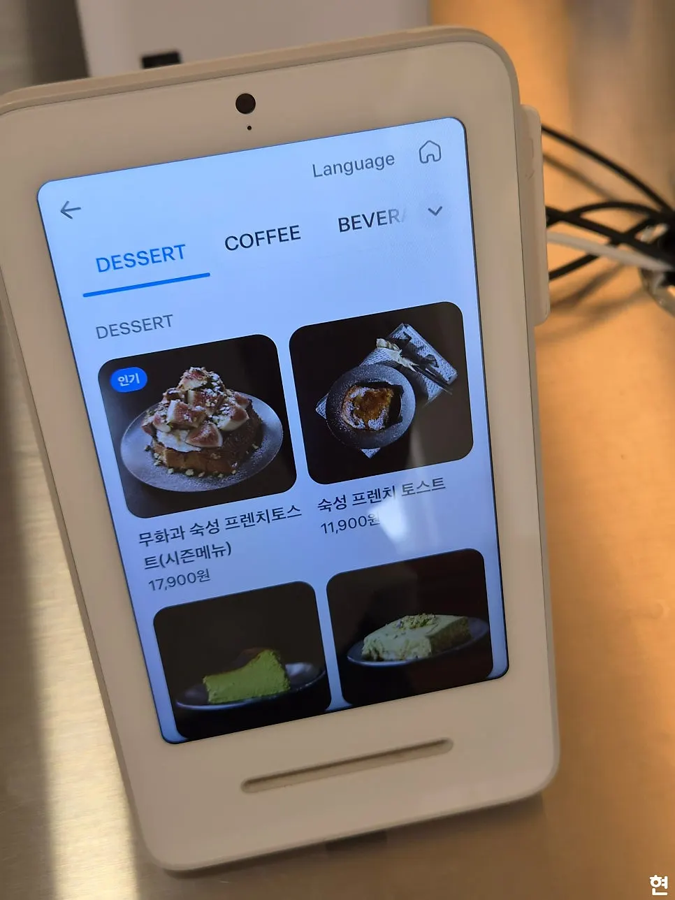 Dessert menu signage with photos at PICT Roastery Mangwon Branch