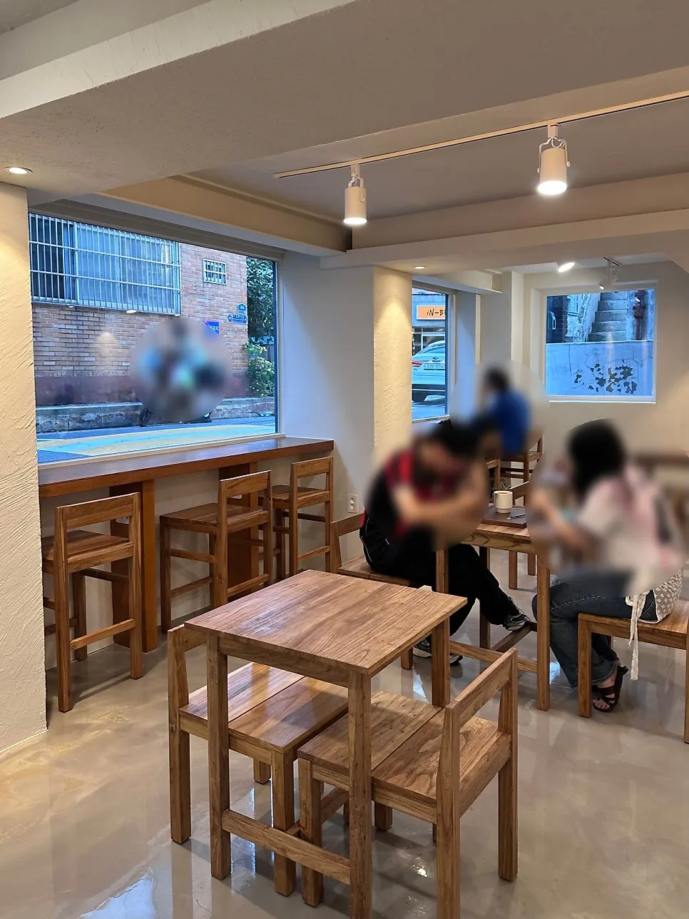 Interior of the well-lit semi-basement café