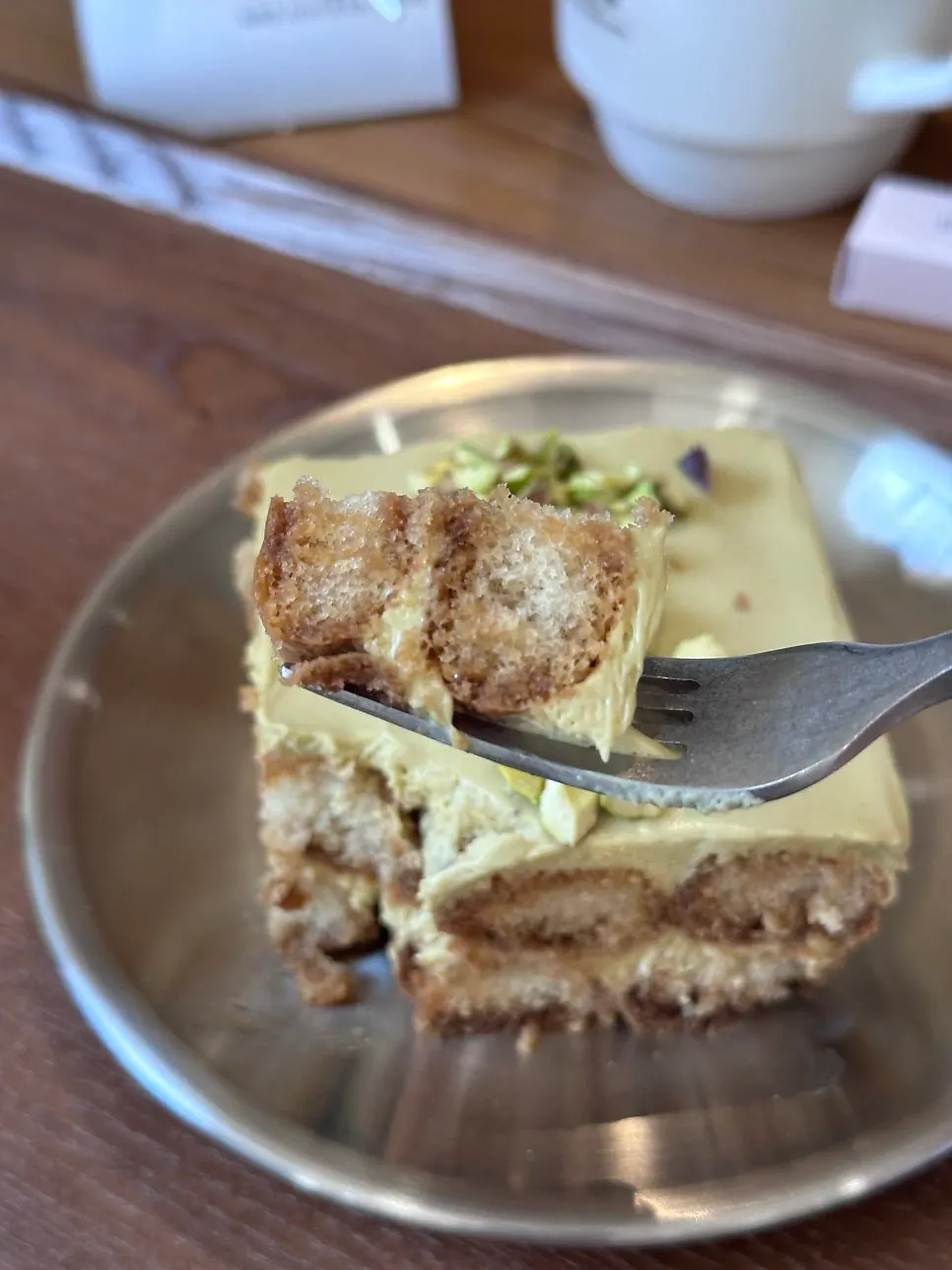 Tiramisu topped with chopped pistachio