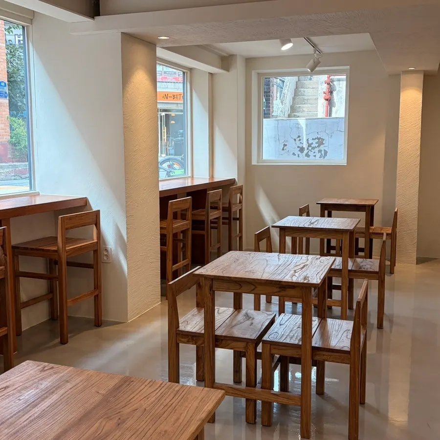 Semi-basement café seating with plenty of natural light