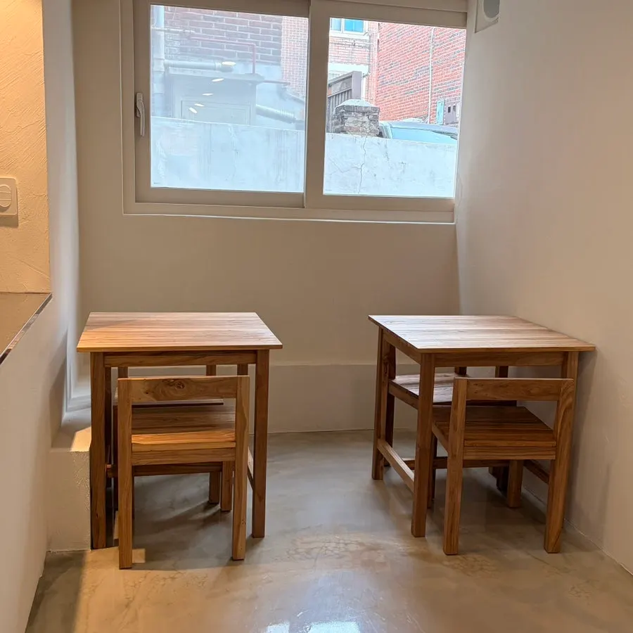 Window work seat with an electrical outlet
