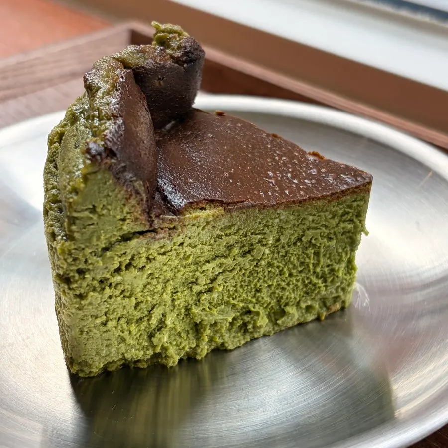 Cross-section of the dense matcha cheesecake