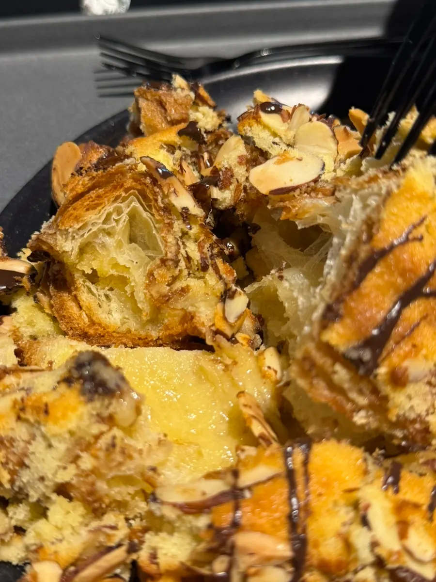 Cross-section of an almond croissant filled with cream