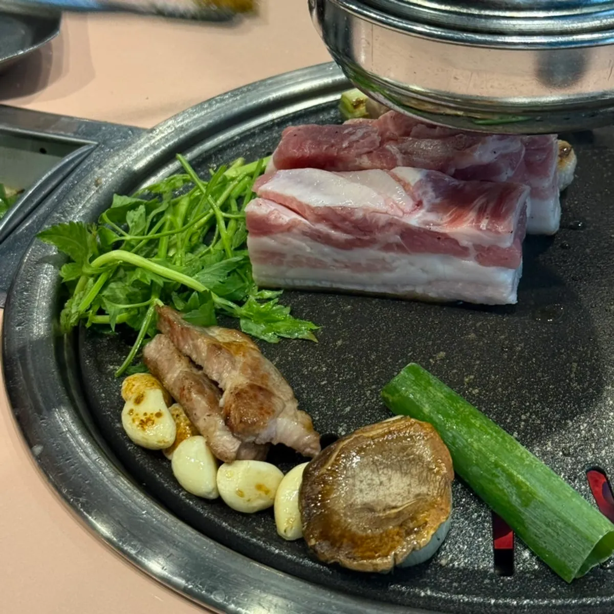 Staff-grilled pork neck at Dwaeji Mansion