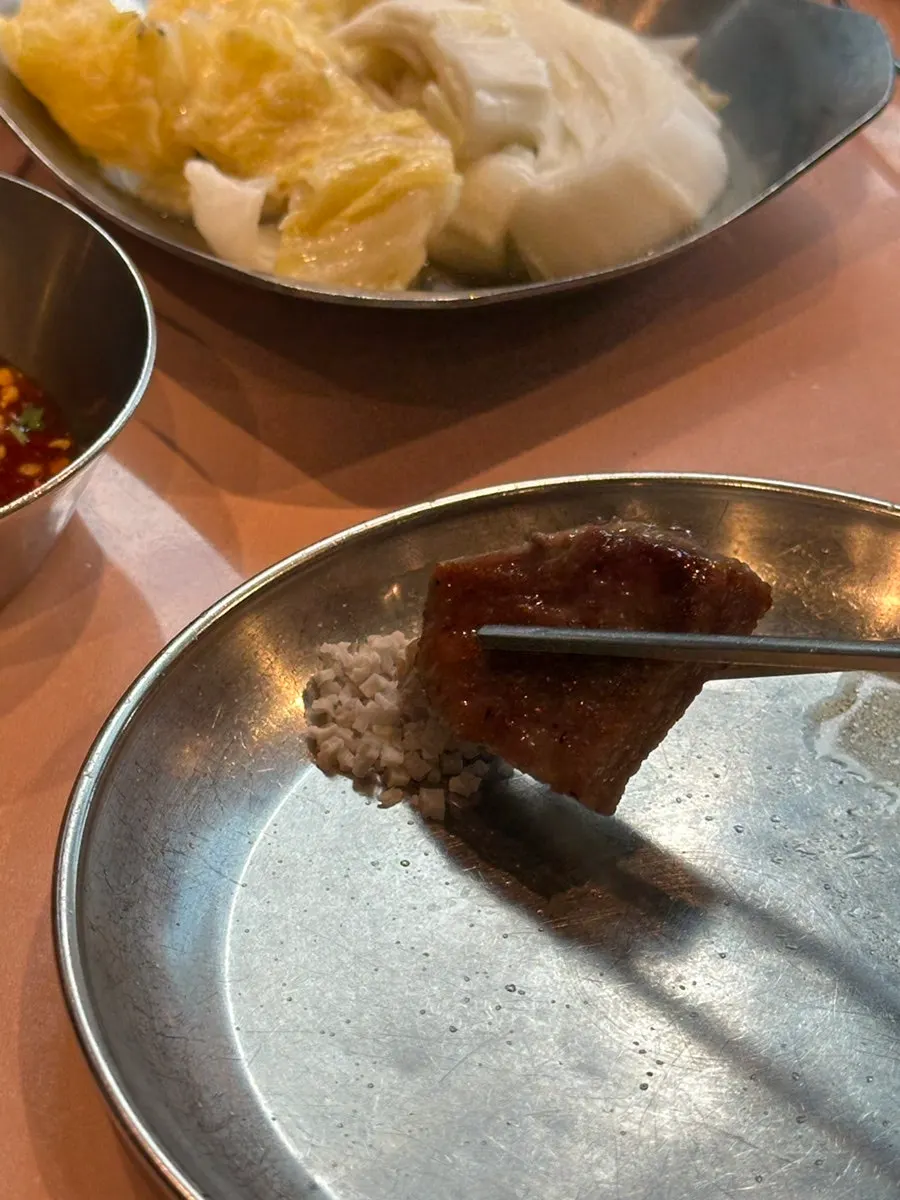 Close-up of a grilled piece of pork belly