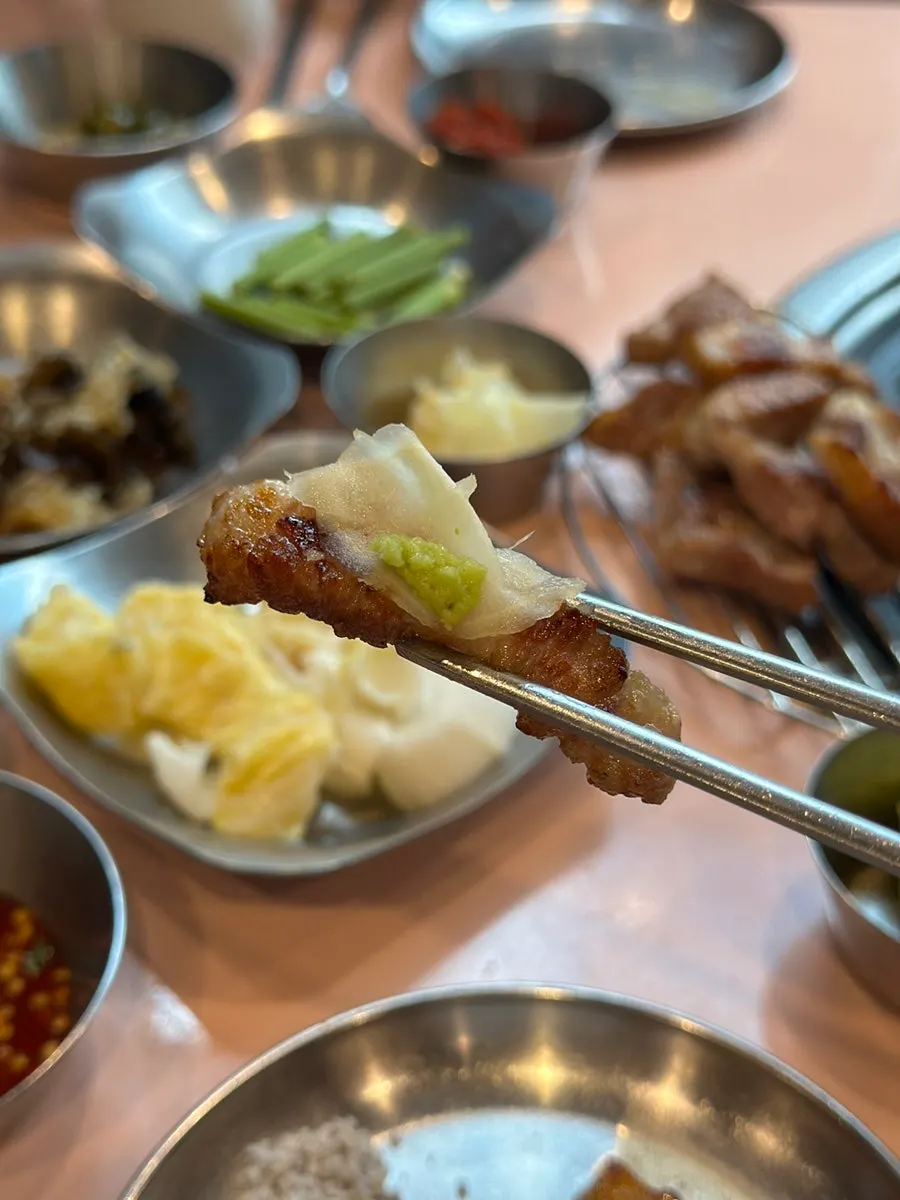 Coarse salt set on the table next to pork belly