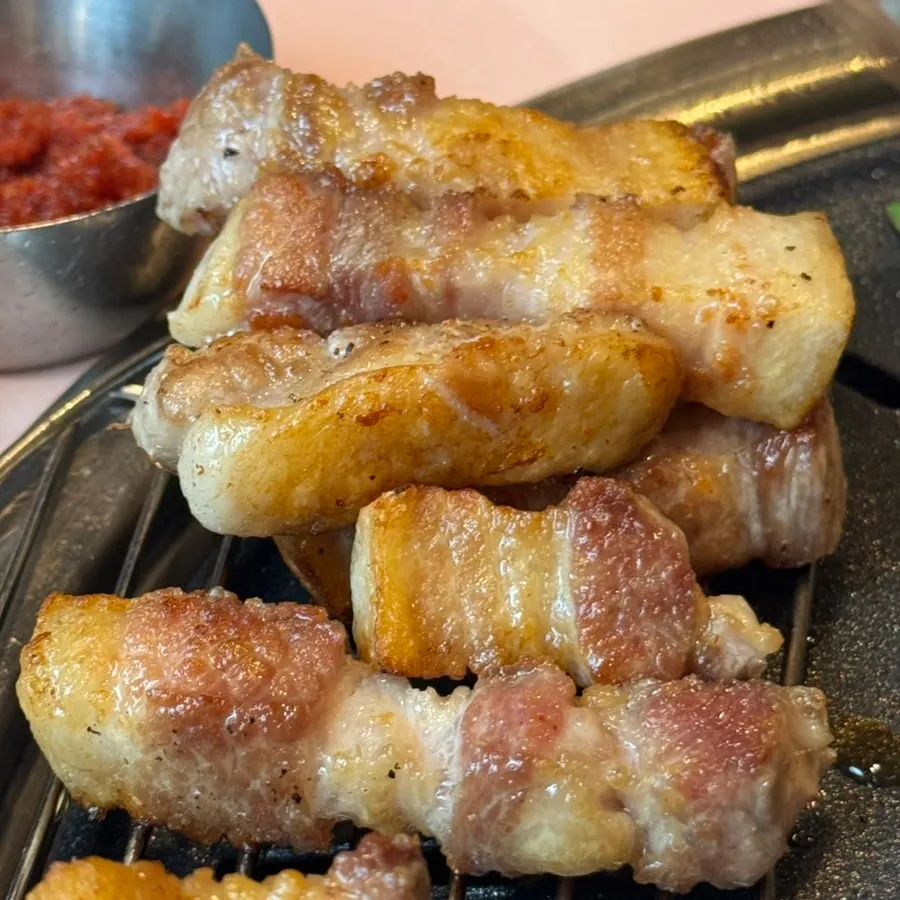 Pork belly paired with minari and green onion