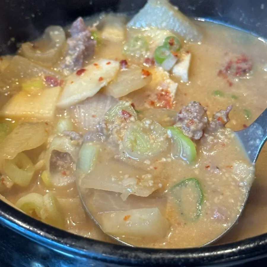 Cheonggukjang stew bubbling in a hot stone pot