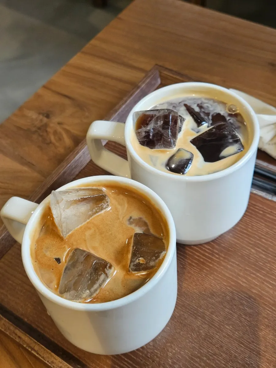 Two iced coffees on the table