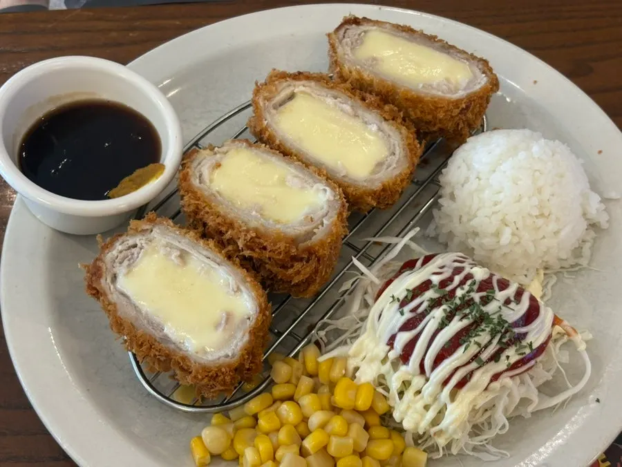 A plate of whole cheese katsu