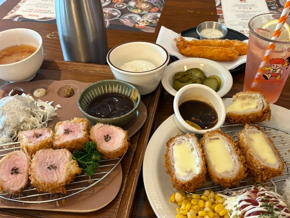 A full spread with tenderloin katsu and whole cheese katsu