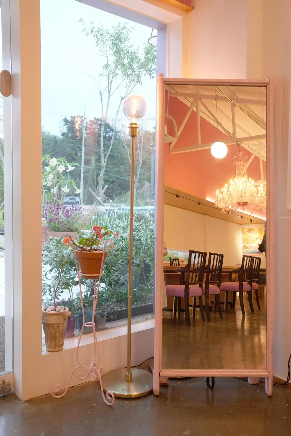 Pink chandelier inside Pink Wall Cafe